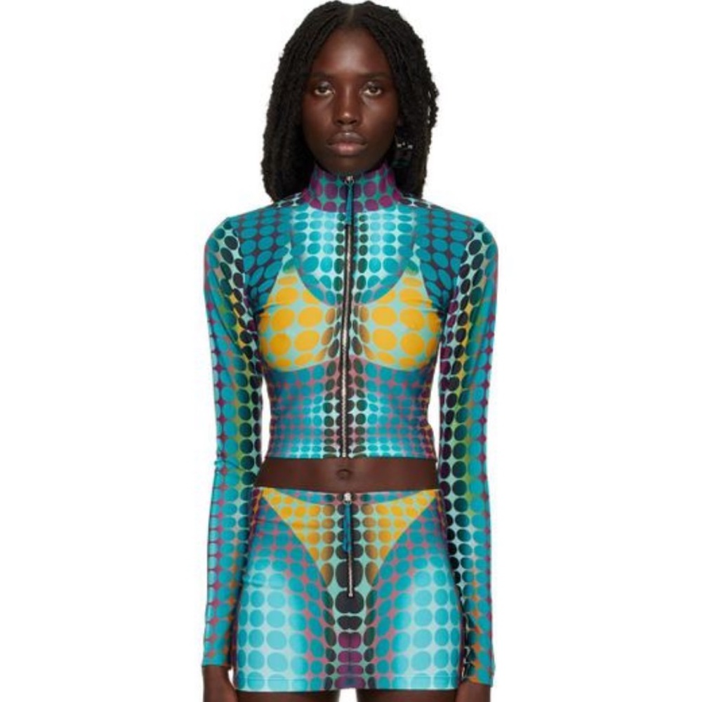 Stretch nylon jersey track jacket. Graphic pattern printed throughout. Worn Once